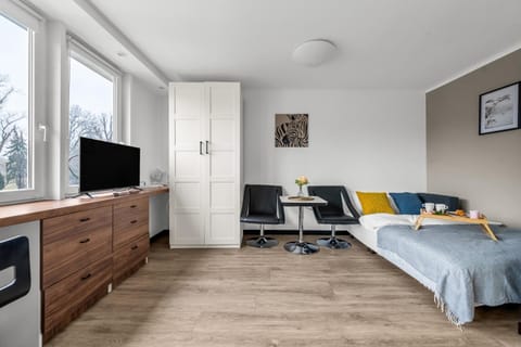 Bed, Living room, Seating area, Bedroom