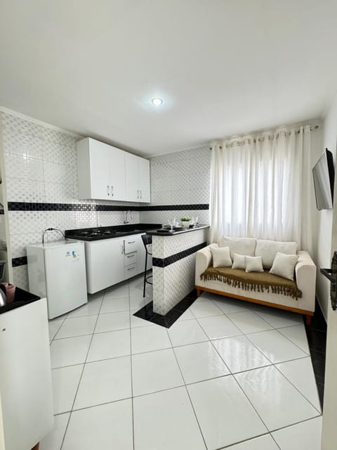Kitchen or kitchenette, Living room, Seating area, minibar, stove