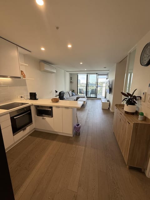 Kitchen or kitchenette, dishwasher, oven, stove