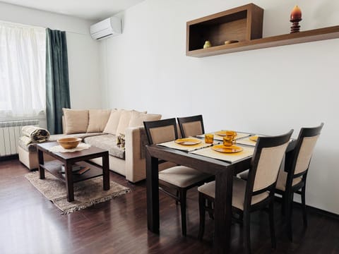 View (from property/room), Living room, Food and drinks, Seating area, Dining area, Food, storage, air conditioner