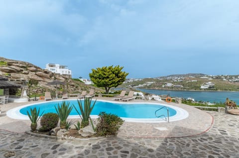 Property building, Living room, Swimming pool