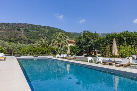 Property building, Living room, Swimming pool
