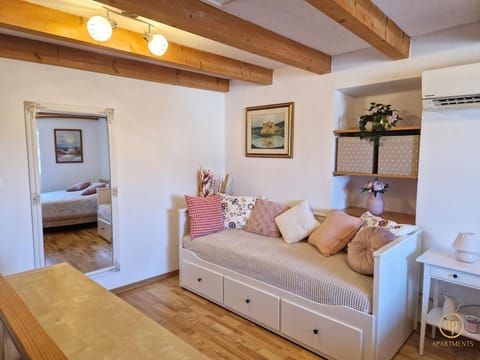 Bed, Seating area, Bedroom