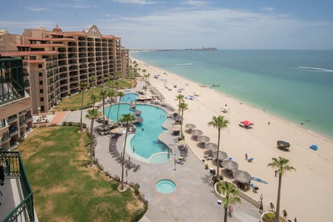 Property building, Beach, Sea view, Swimming pool, sunbed