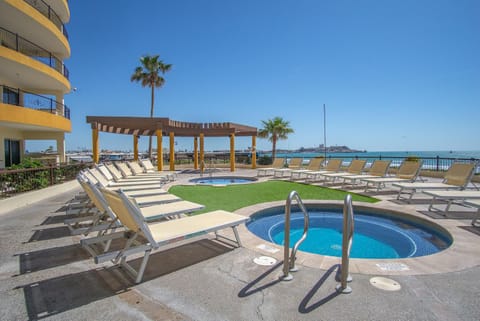 Property building, Patio, Day, Sea view, Swimming pool, sunbed