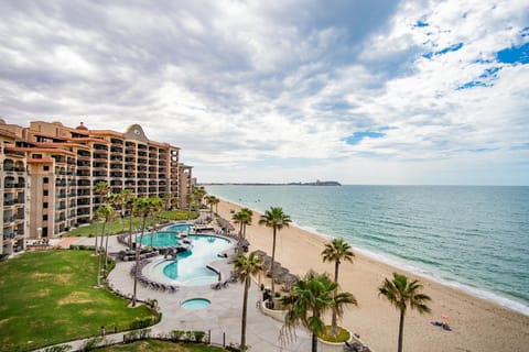 Property building, Beach, Sea view, Swimming pool, sunbed