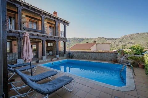 Property building, Living room, Swimming pool