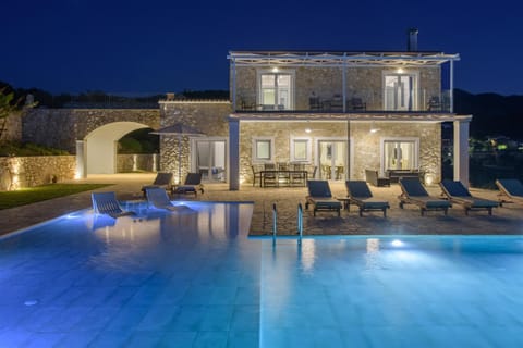 Property building, Patio, Night, Pool view, Swimming pool, sunbed