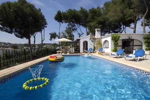 Property building, Living room, Swimming pool