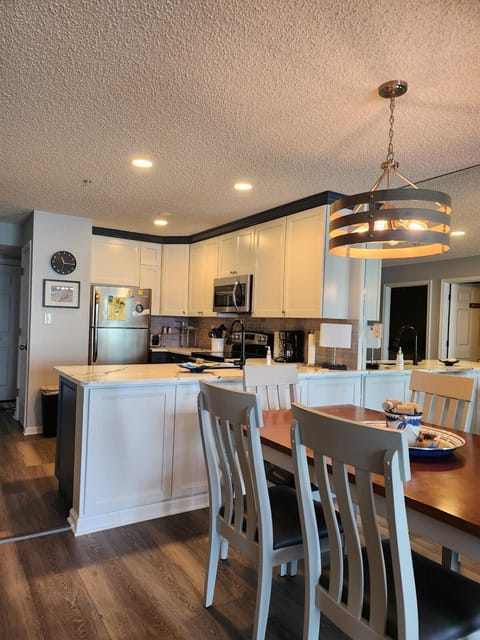 Dining area, dishwasher, stove, toaster, kitchen
