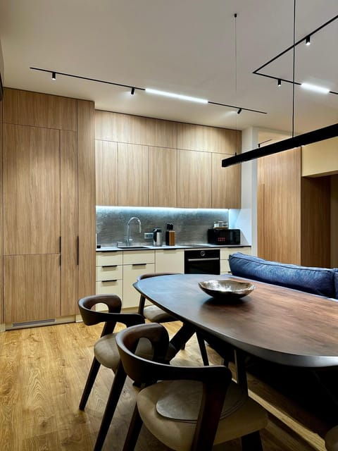 Kitchen or kitchenette, Living room, Seating area, Dining area