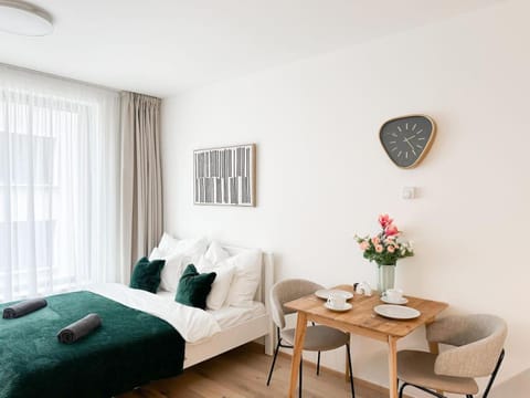 Bed, Living room, Seating area, Bedroom