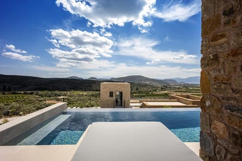Patio, Day, Natural landscape, Mountain view, Pool view, Swimming pool, sunbed