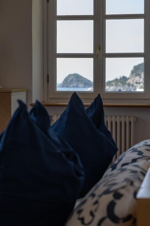 Bed, Natural landscape, Bedroom, Sea view