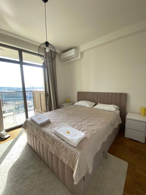 Bed, Photo of the whole room, Bedroom, towels, air conditioner