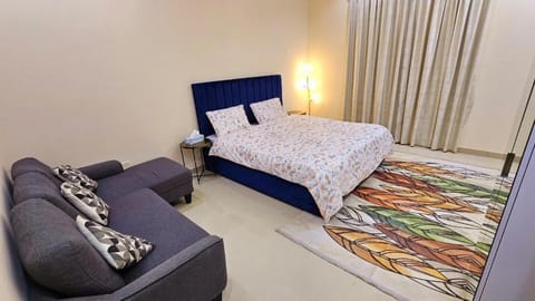 King Room with Attached Private Bathroom in Shared Apartment Vacation rental in Al Sharjah