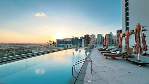 View (from property/room), Swimming pool, Sunset, sunbed