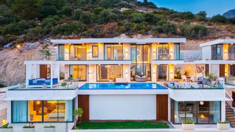 Property building, Patio, Swimming pool, sunbed