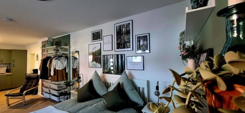 Bed, Living room, Seating area, wardrobe