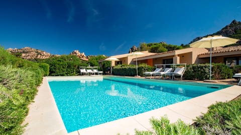 Property building, Spring, Natural landscape, Pool view, Swimming pool, sunbed