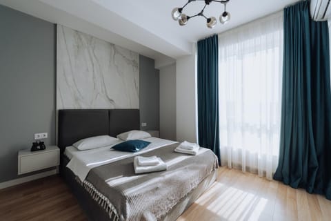 Bed, Photo of the whole room, Bedroom, towels, air conditioner