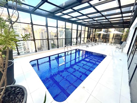 Swimming pool, sunbed