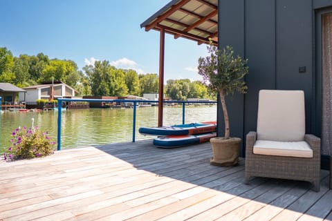 Patio, Natural landscape, Activities, Seating area, River view