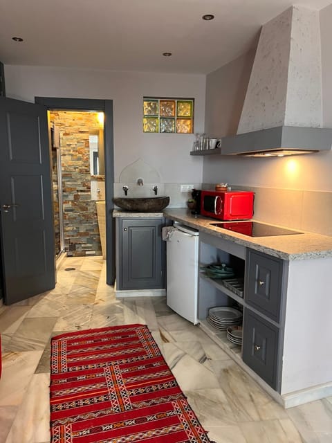 Kitchen or kitchenette, stove