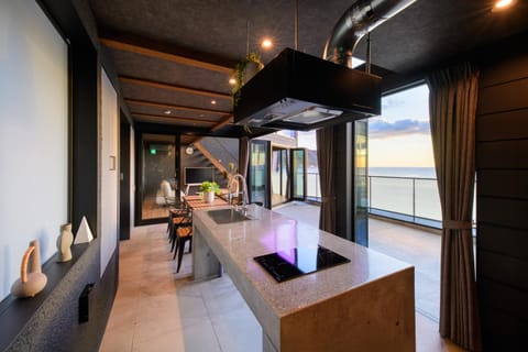 Natural landscape, Kitchen or kitchenette, Living room, Seating area, Dining area, Sea view