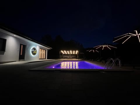 Property building, Night, Pool view, Swimming pool