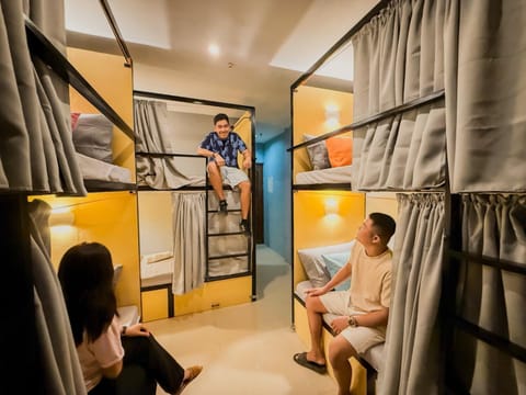 People, bunk bed, air conditioner