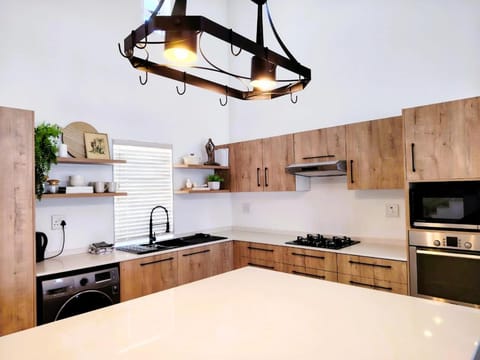 Kitchen or kitchenette, oven, stove