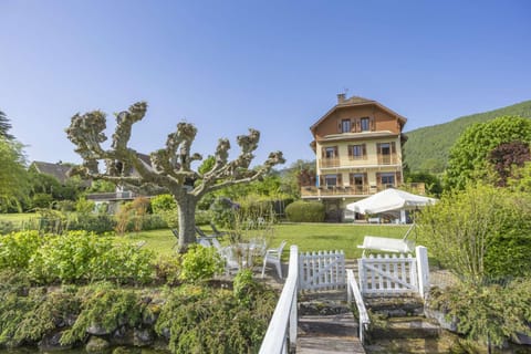 Property building, Spring, Day, Natural landscape, Garden, Garden view, Mountain view