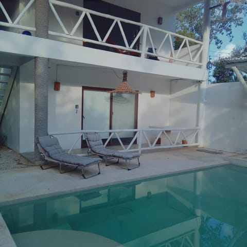 Swimming pool, sunbed
