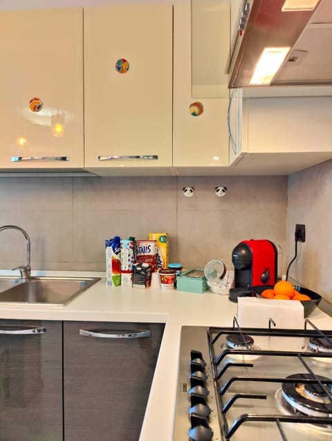 Kitchen or kitchenette, oven, stove