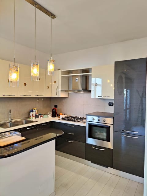 Kitchen or kitchenette, oven, stove