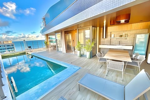 Shower, Property building, Day, Natural landscape, Bird's eye view, Summer, Snorkeling, View (from property/room), Balcony/Terrace, Seating area, On site, City view, Mountain view, Pool view, Sea view, Street view, Swimming pool, Entertainment, Time of day, Sunset, Open Air Bath, Family