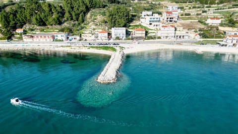 Property building, Natural landscape, Bird's eye view, Beach, Sea view
