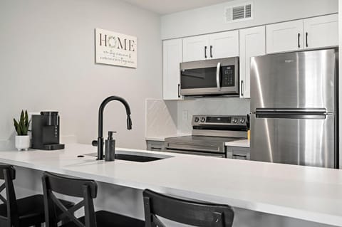 Kitchen or kitchenette, oven, stove