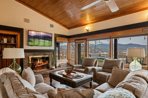 Natural landscape, Living room, Seating area, Mountain view, fireplace