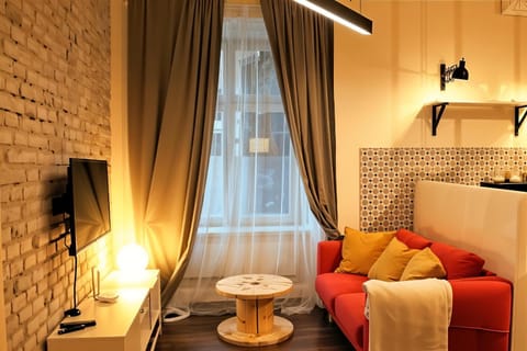 Bed, TV and multimedia, Living room, Photo of the whole room, Seating area, Bedroom
