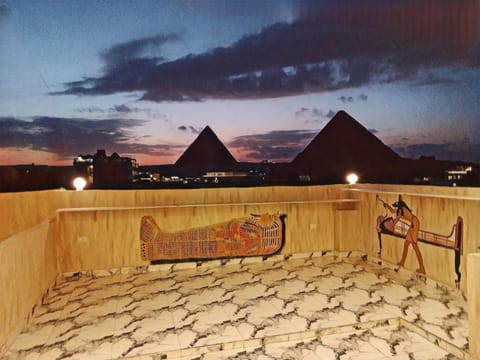 Nearby landmark, Night, Natural landscape, View (from property/room), Seating area