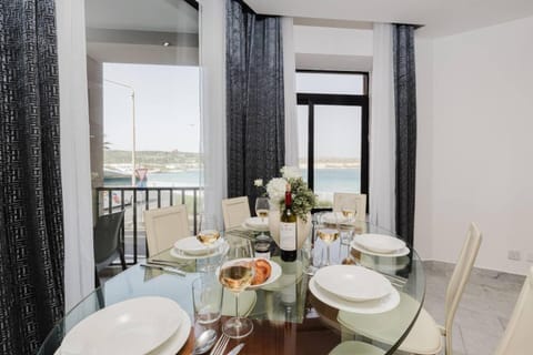 Beachfront Flat with Sea Views by Homely Malta! Apartment in Malta