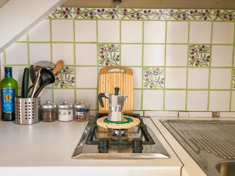 Kitchen or kitchenette, stove