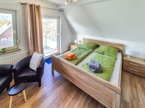 Bed, Seating area, Bedroom