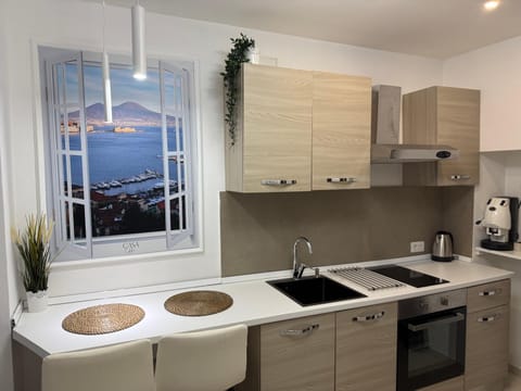 Kitchen or kitchenette, stove