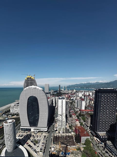 Property building, Nearby landmark, Communal lounge/ TV room, Day, Natural landscape, Bird's eye view, View (from property/room), View (from property/room), Evening entertainment, City view, City view, Landmark view, Mountain view, Mountain view, Sea view, Street view, Location