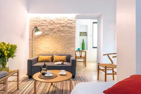 Property building, TV and multimedia, Living room, Seating area, air conditioner