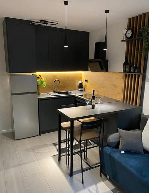 Kitchen or kitchenette, Living room, Seating area, Dining area, stove