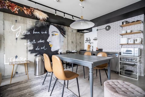 Dining area, microwave, stove, toaster, kitchen